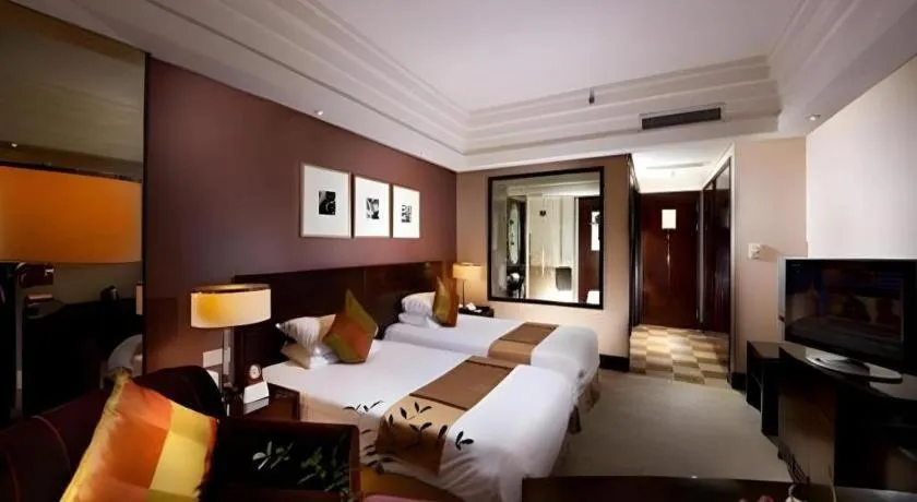 Bed in New Century Hangzhou Grand Hotel