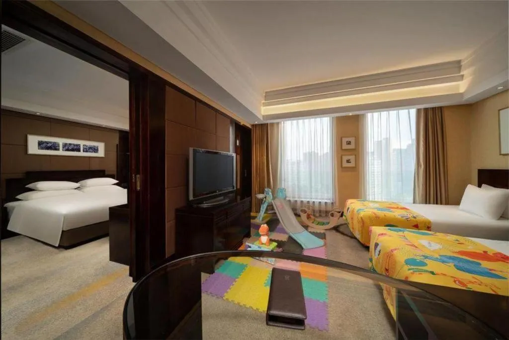 Bed in New Century Hangzhou Grand Hotel