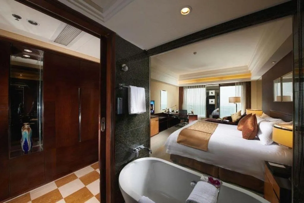 Bed in New Century Hangzhou Grand Hotel