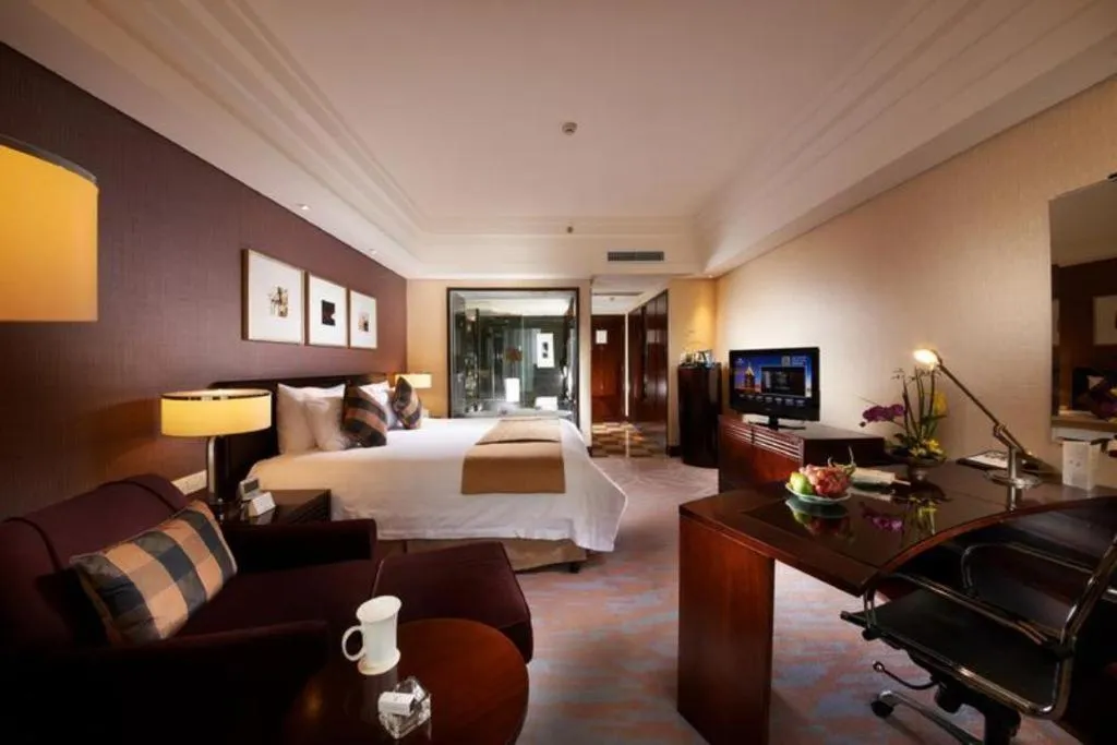 Bed in New Century Hangzhou Grand Hotel