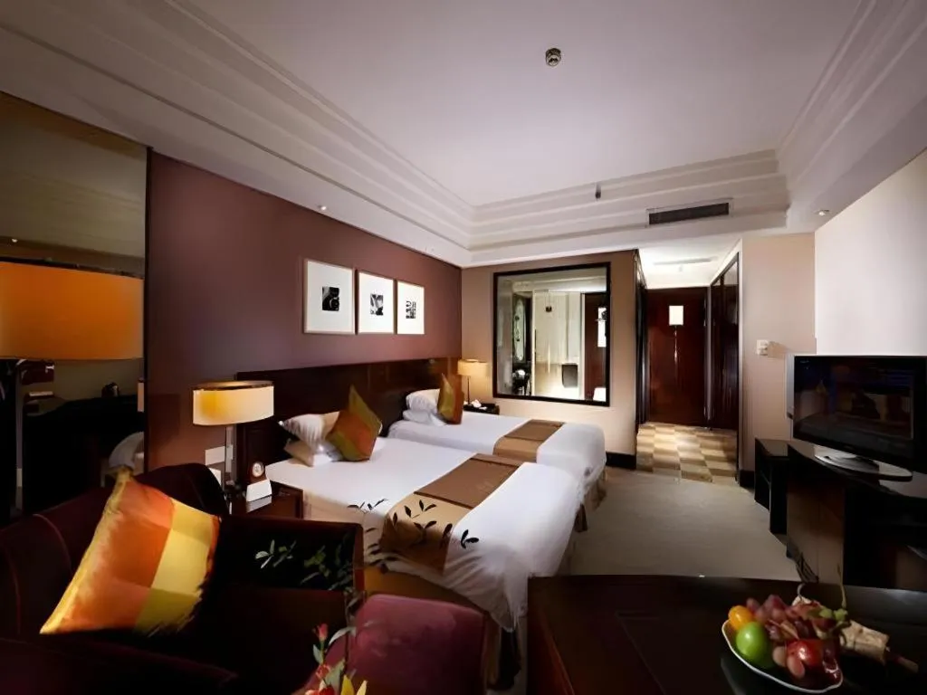 Bed in New Century Hangzhou Grand Hotel