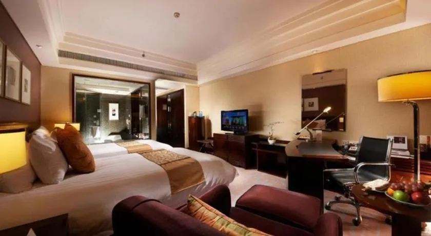 Bed in New Century Hangzhou Grand Hotel
