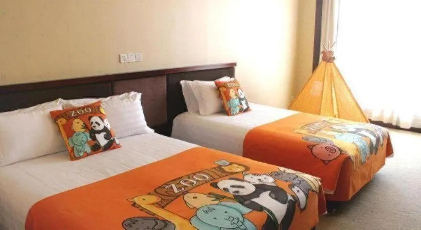 Bed in New Century Hotel Ninghai