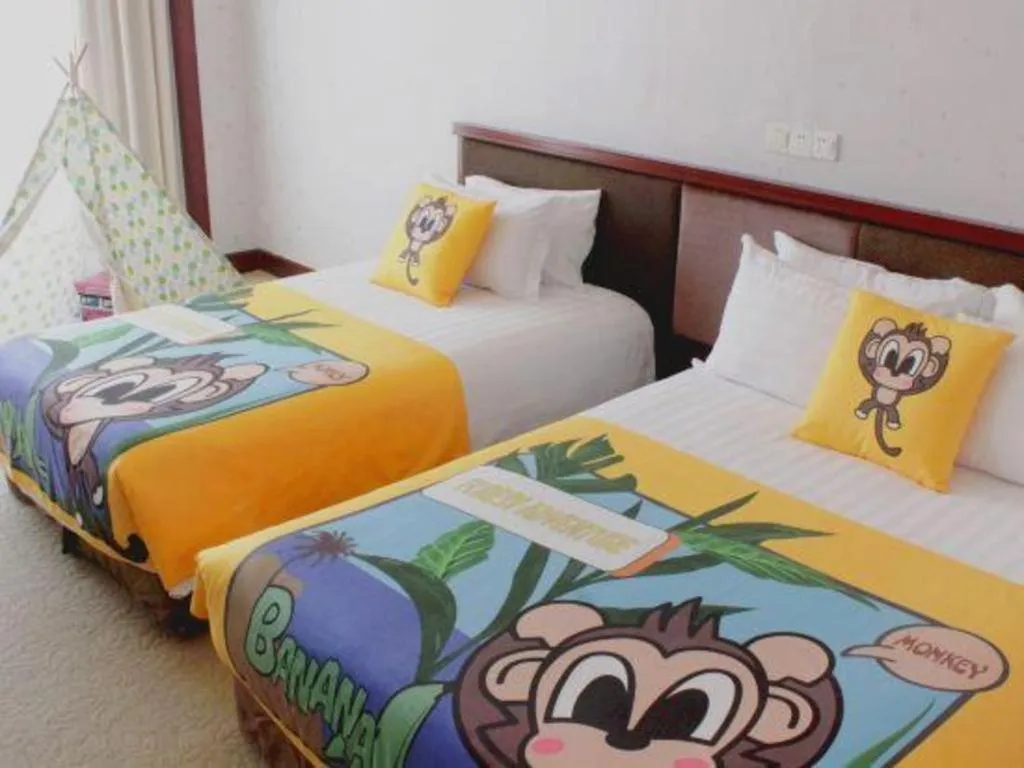 Bed in New Century Hotel Ninghai