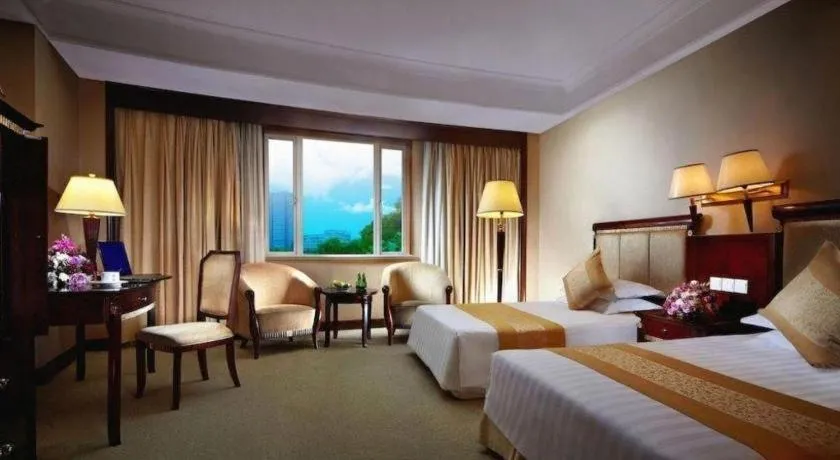 Bed in New Century Hotel Taizhou