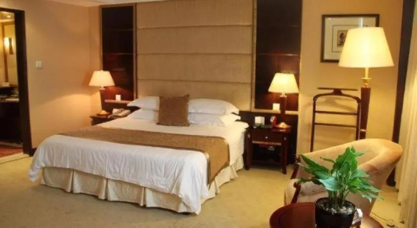 Bed in New Century Hotel Taizhou