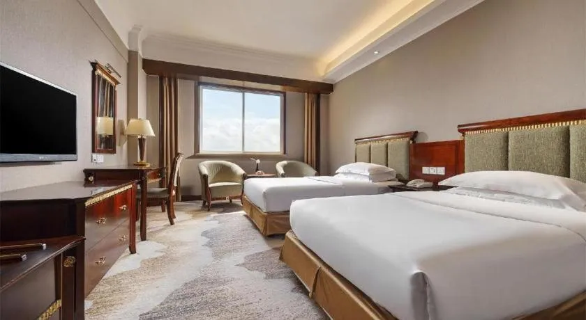 Bed in New Century Hotel Taizhou
