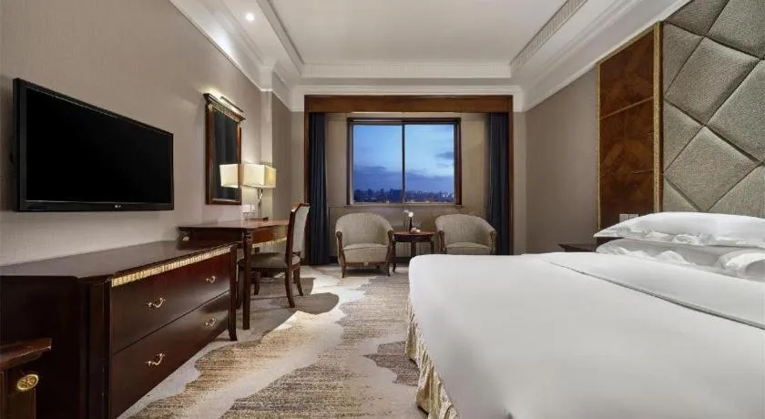 Bed in New Century Hotel Taizhou