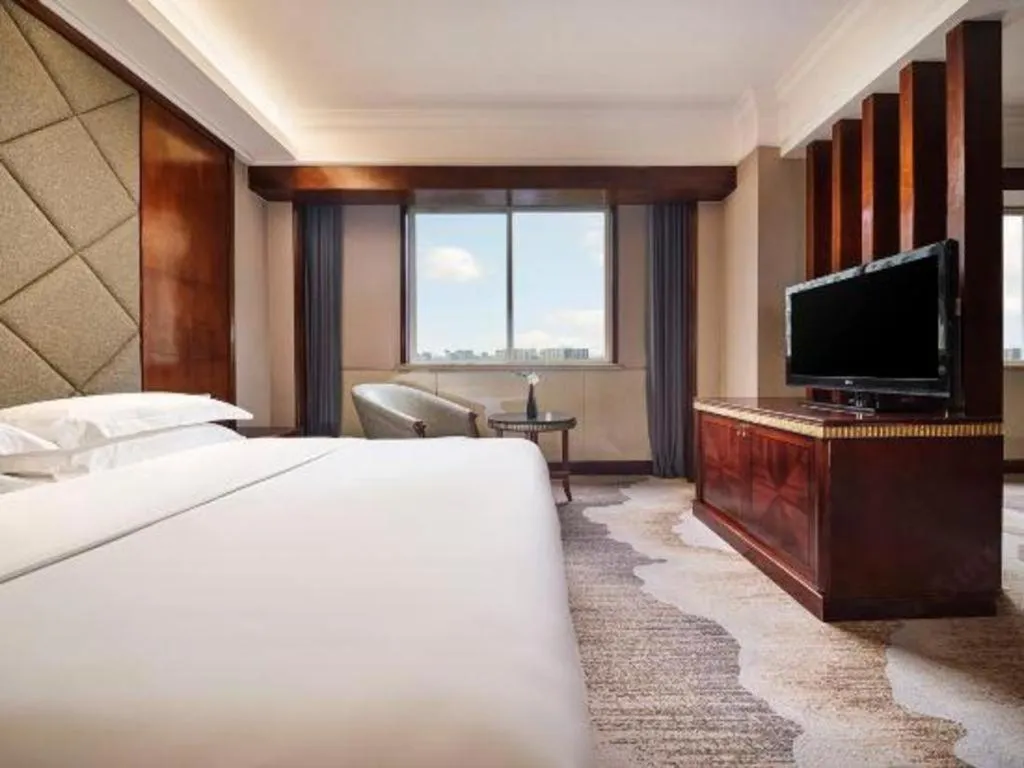 Bed in New Century Hotel Taizhou