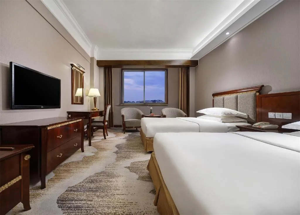 Bed in New Century Hotel Taizhou