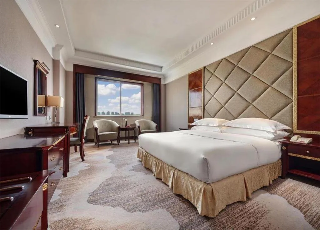 Bed in New Century Hotel Taizhou