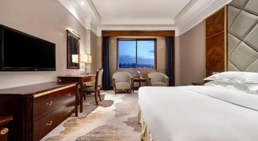 Bed in New Century Hotel Taizhou