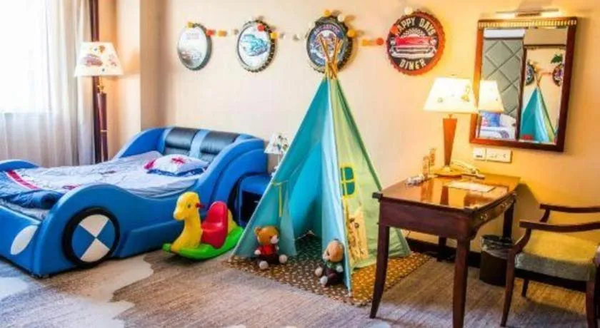 Bed in New Century Hotel Taizhou