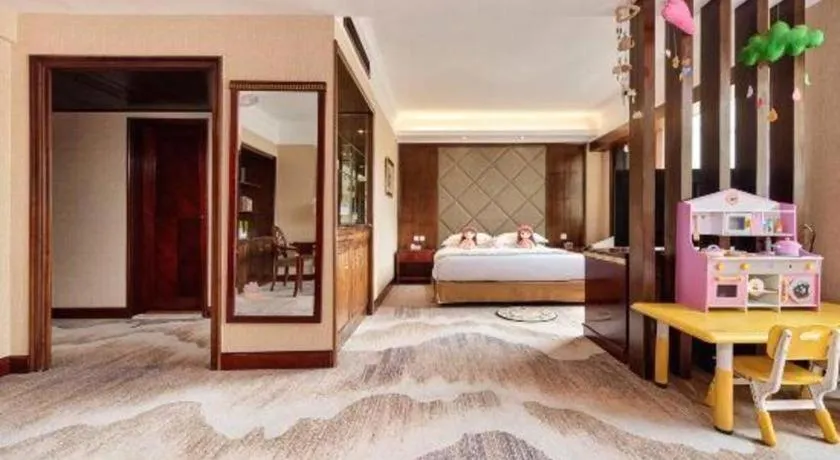 Bed in New Century Hotel Taizhou