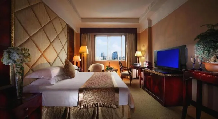 Bed in New Century Hotel Taizhou
