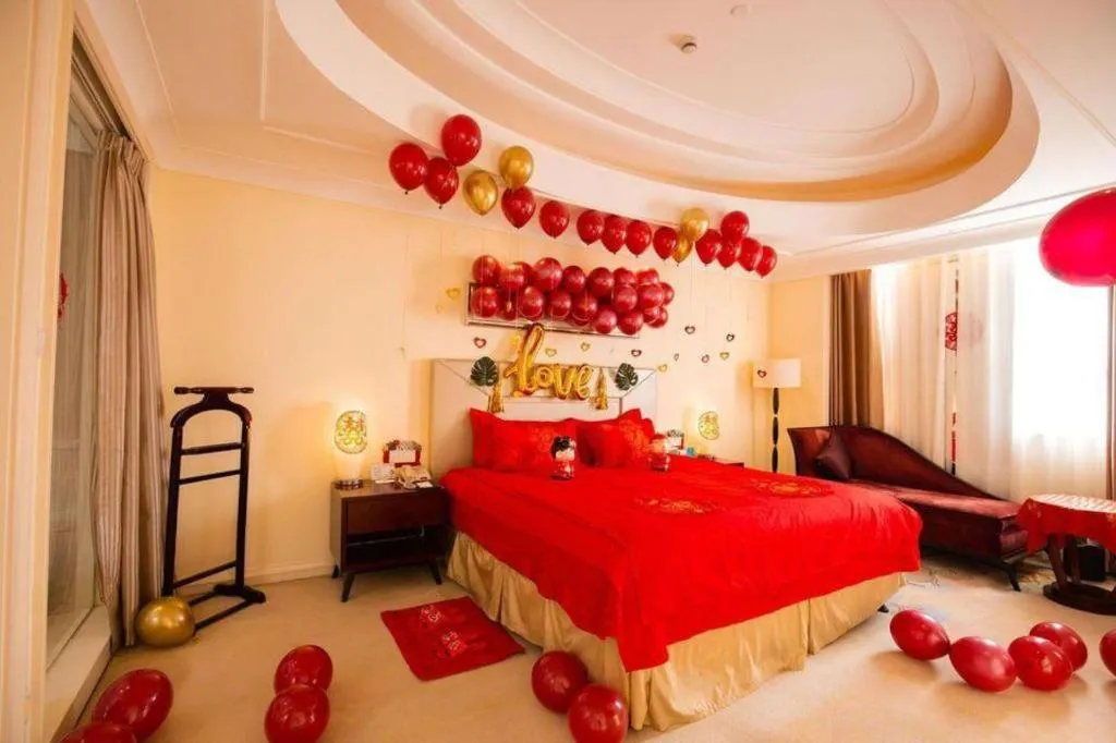 Bed in New Century Grand Changchun Hotel