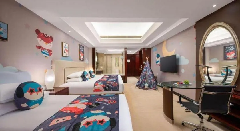 Bed in New Century Grand Changchun Hotel