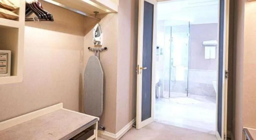 Bed in New Century Grand Changchun Hotel