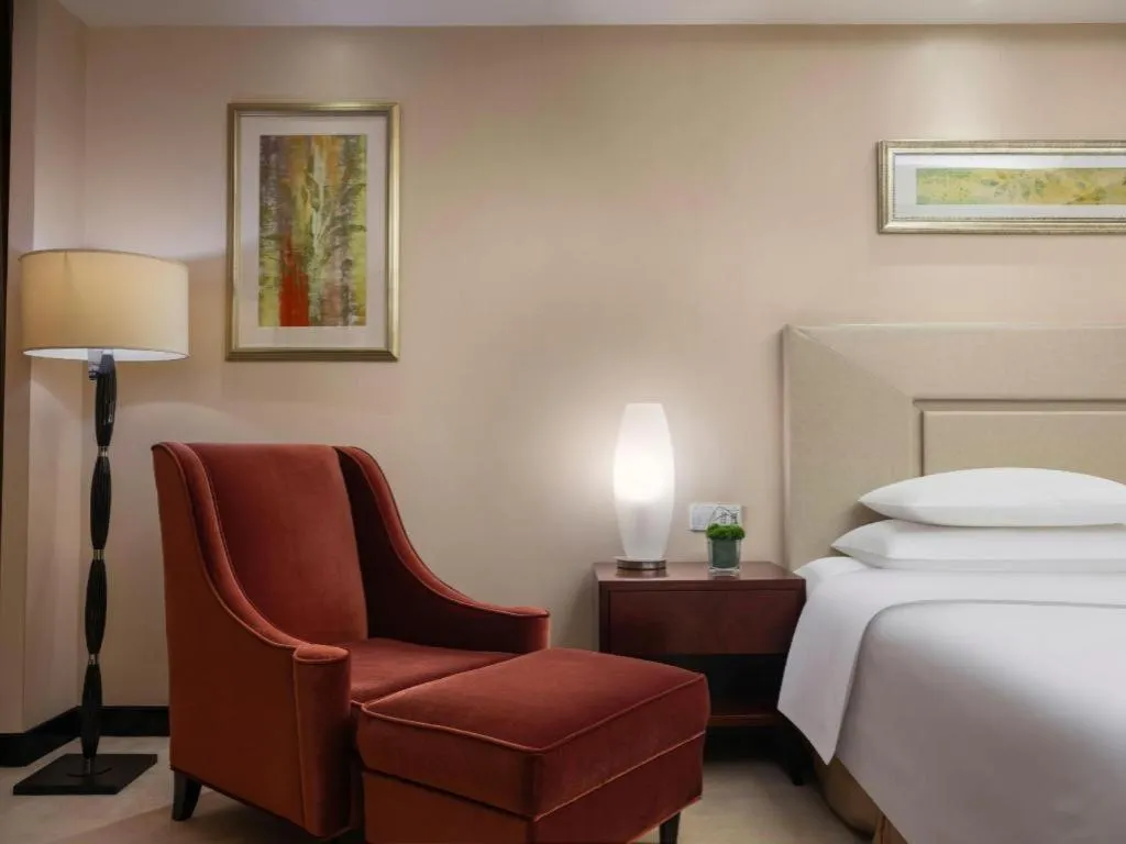 Bed in New Century Grand Changchun Hotel