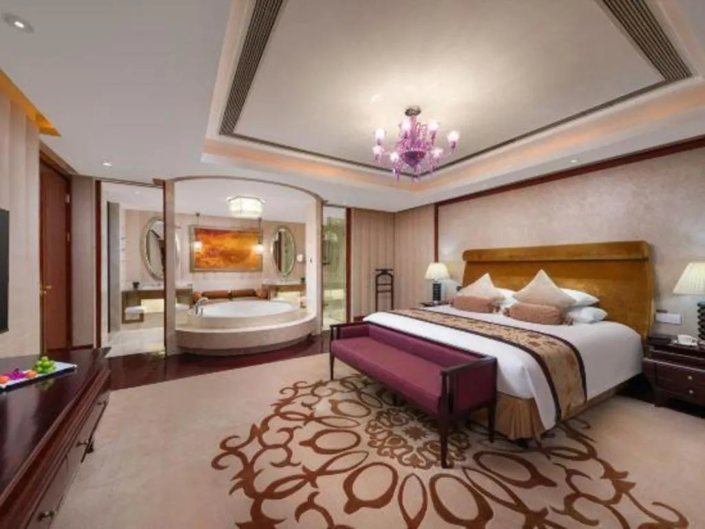 Bed in New Century Grand Changchun Hotel