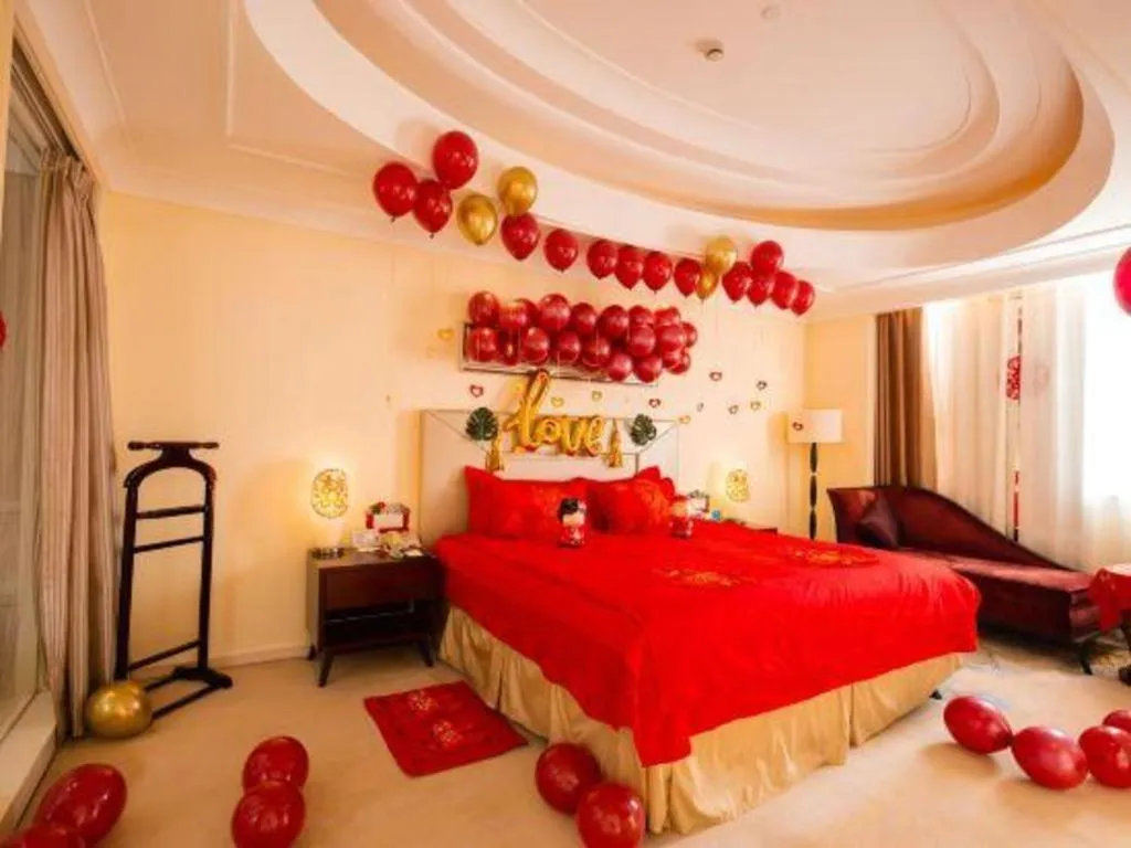 Bed in New Century Grand Changchun Hotel