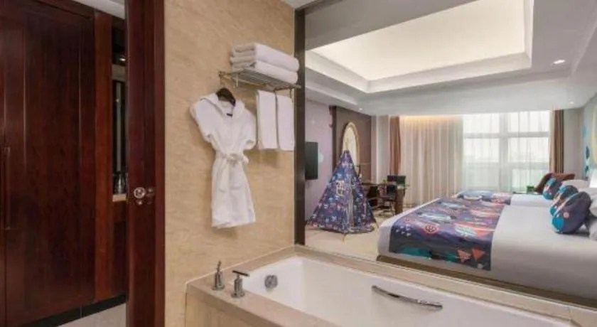 Bed in New Century Grand Changchun Hotel