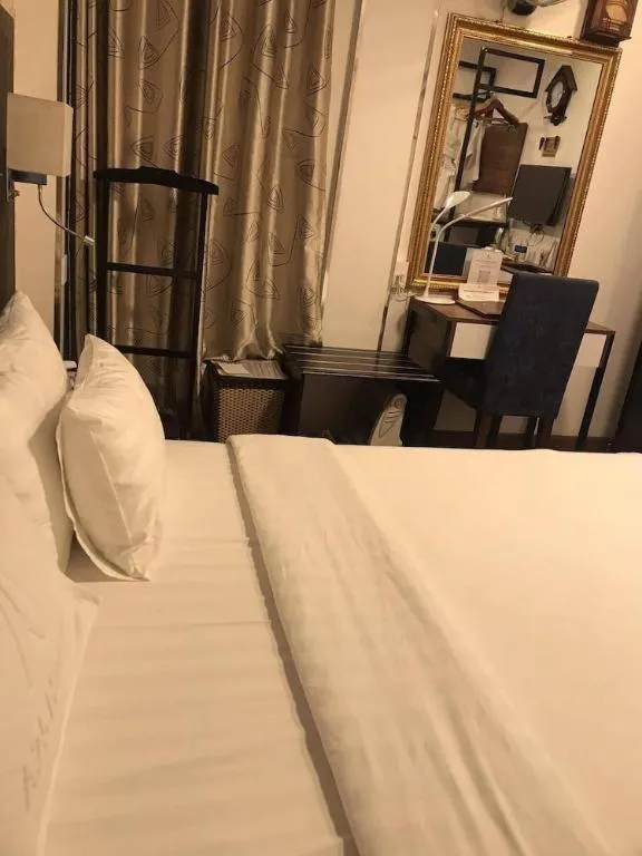 Bed in New Moon Hotel
