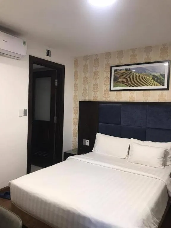 Bed in New Moon Hotel