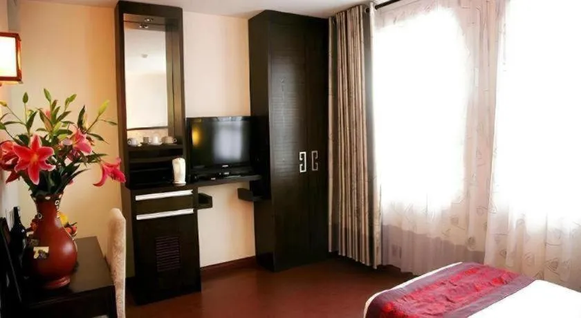 Bed in New Moon Hotel