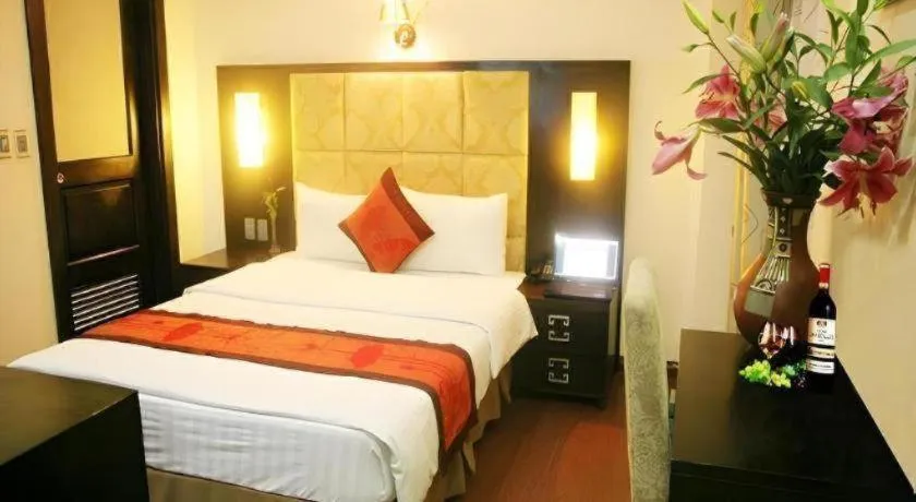 Bed in New Moon Hotel