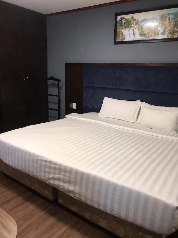 Bed in New Moon Hotel