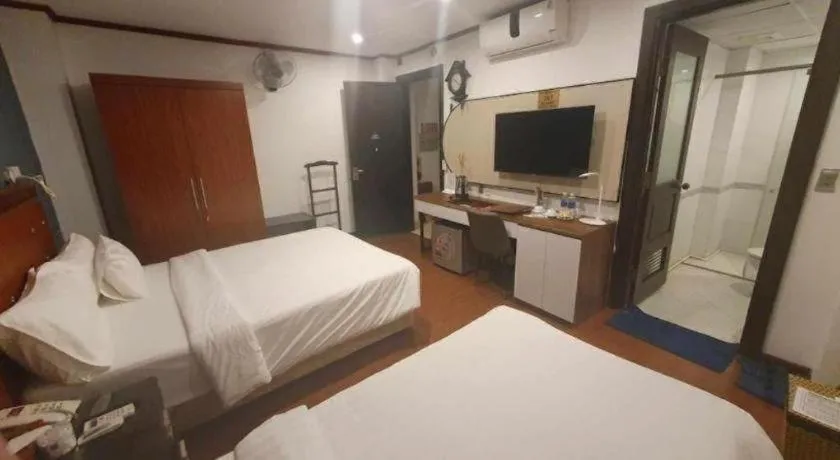 Bed in New Moon Hotel