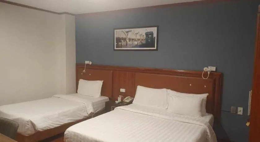 Bed in New Moon Hotel