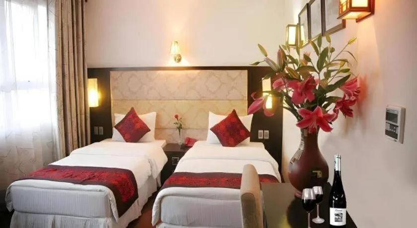 Bed in New Moon Hotel