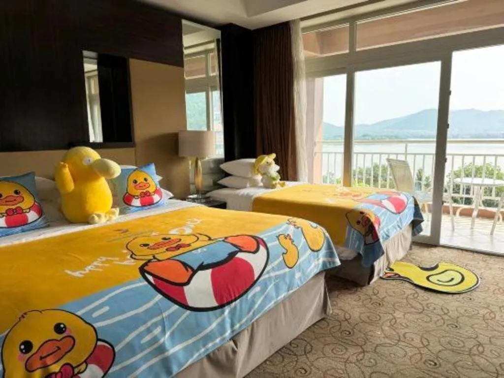 Bed in New Century Grand Hotel Xuzhou