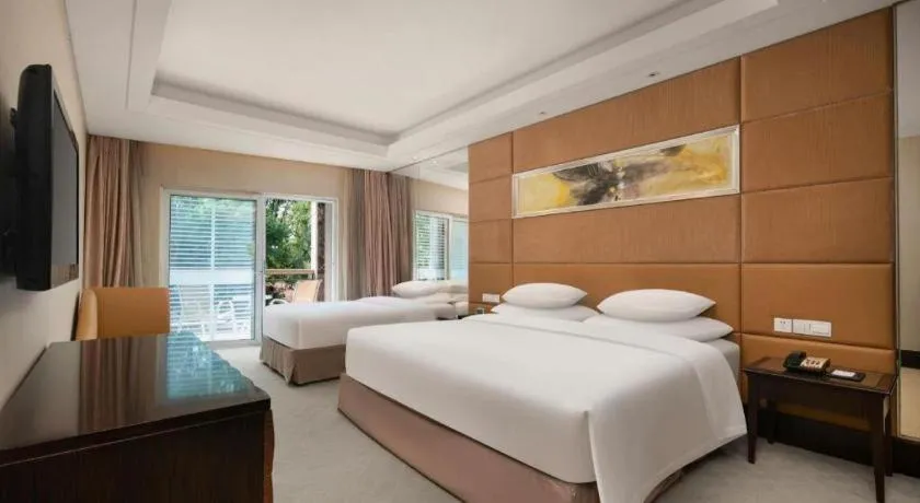 Bed in New Century Grand Hotel Xuzhou