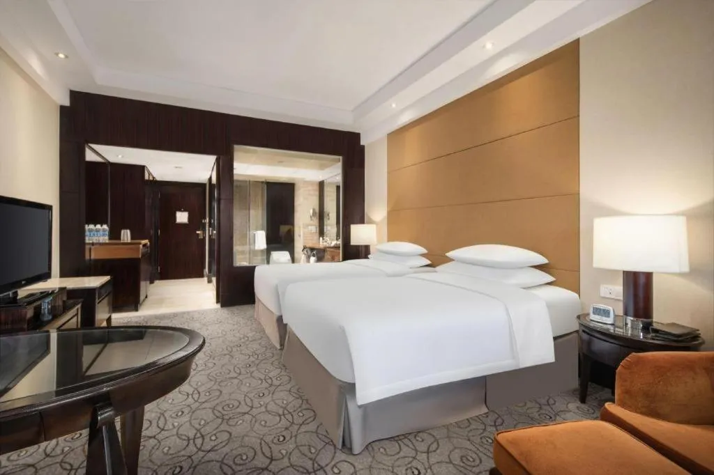Bed in New Century Grand Hotel Xuzhou