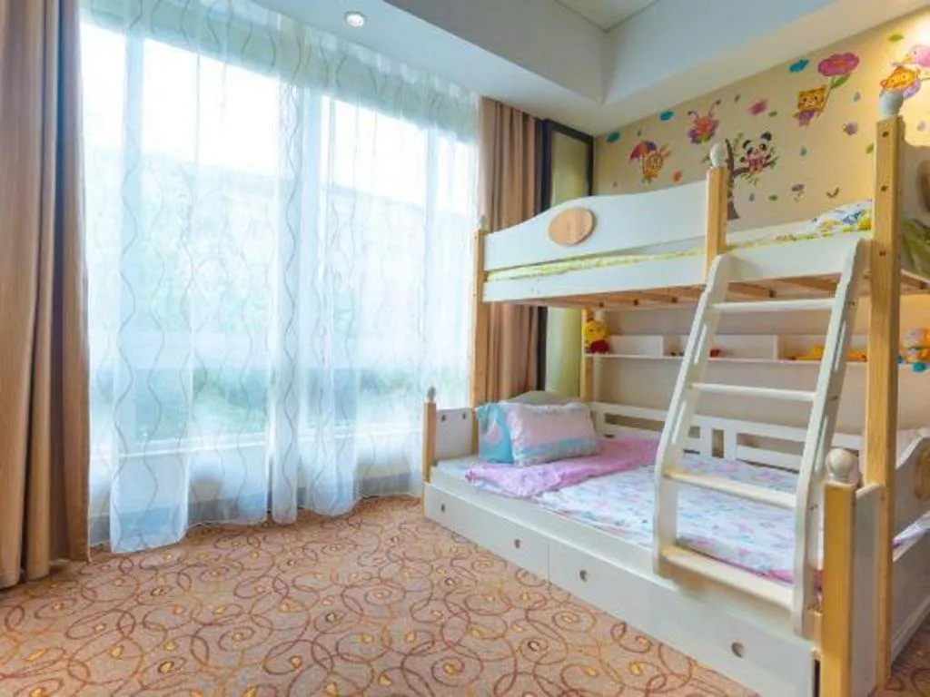 Bed in New Century Grand Hotel Xuzhou