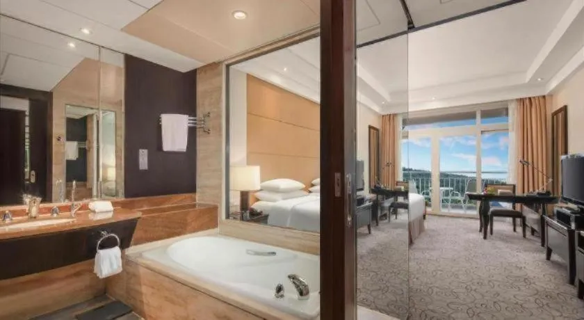 Bed in New Century Grand Hotel Xuzhou