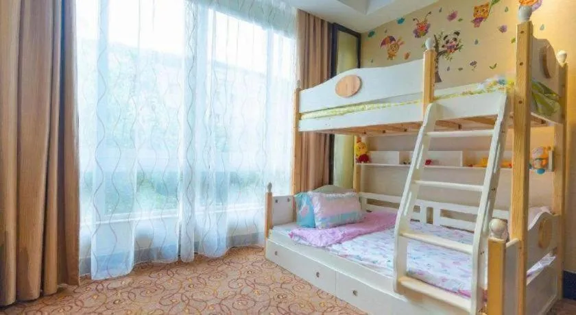 Bed in New Century Grand Hotel Xuzhou