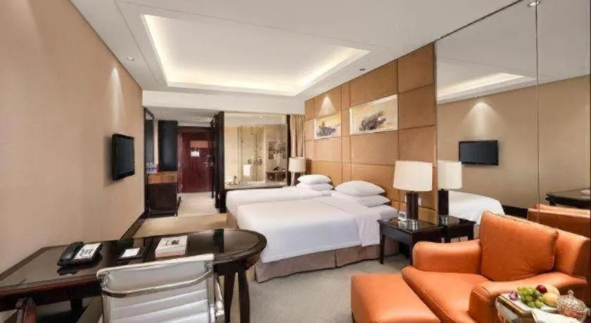 Bed in New Century Grand Hotel Xuzhou