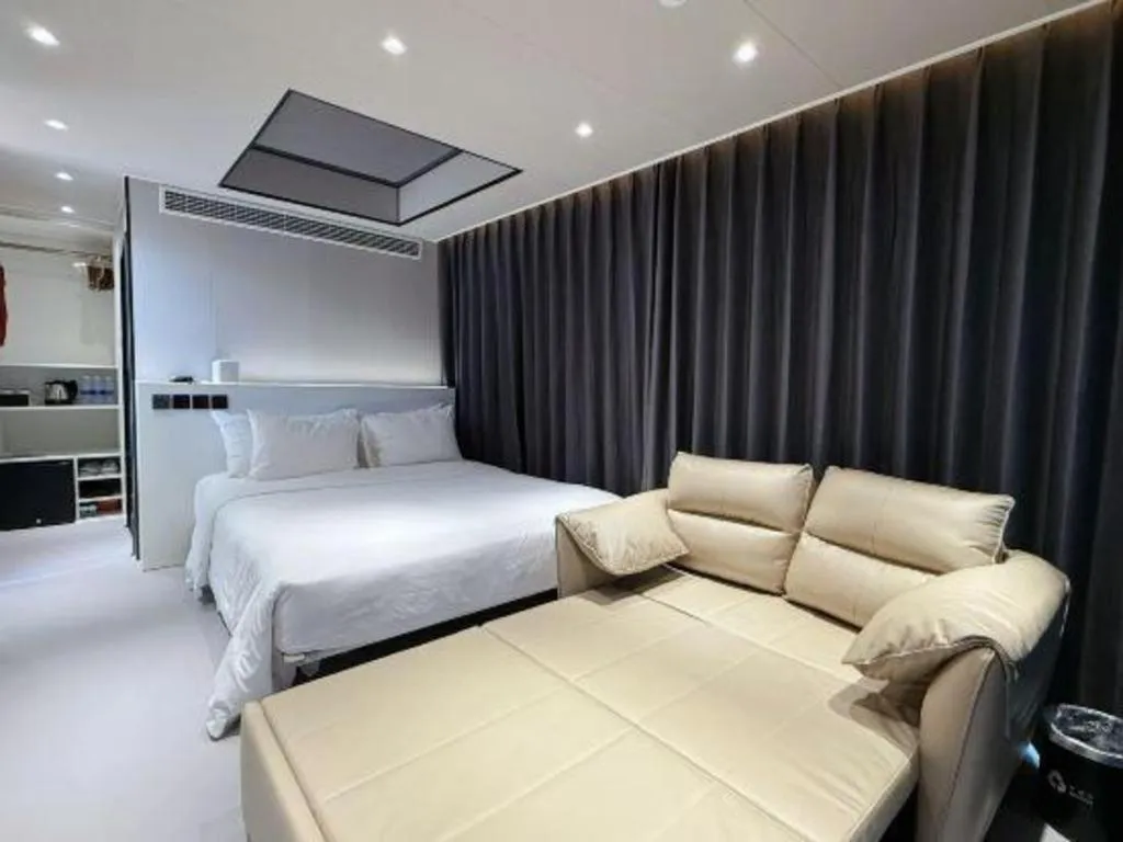 Bed in New Century Grand Hotel Xuzhou