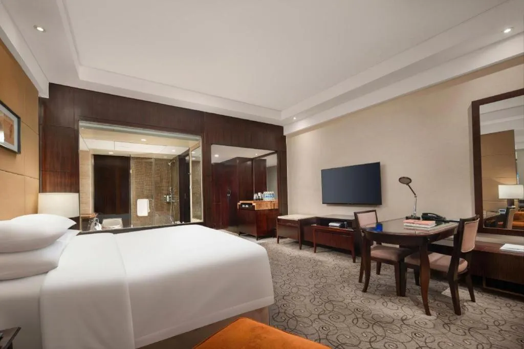 Bed in New Century Grand Hotel Xuzhou