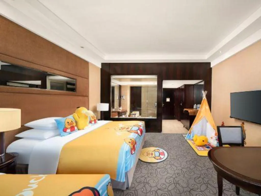 Bed in New Century Grand Hotel Xuzhou
