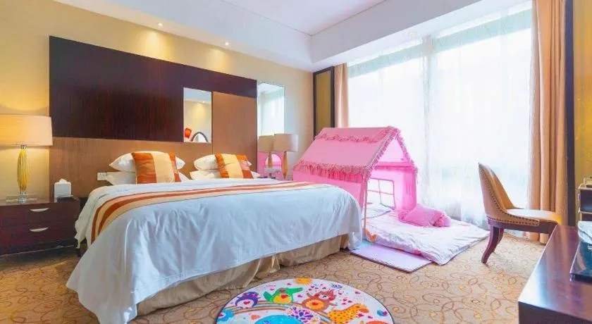 Bed in New Century Grand Hotel Xuzhou