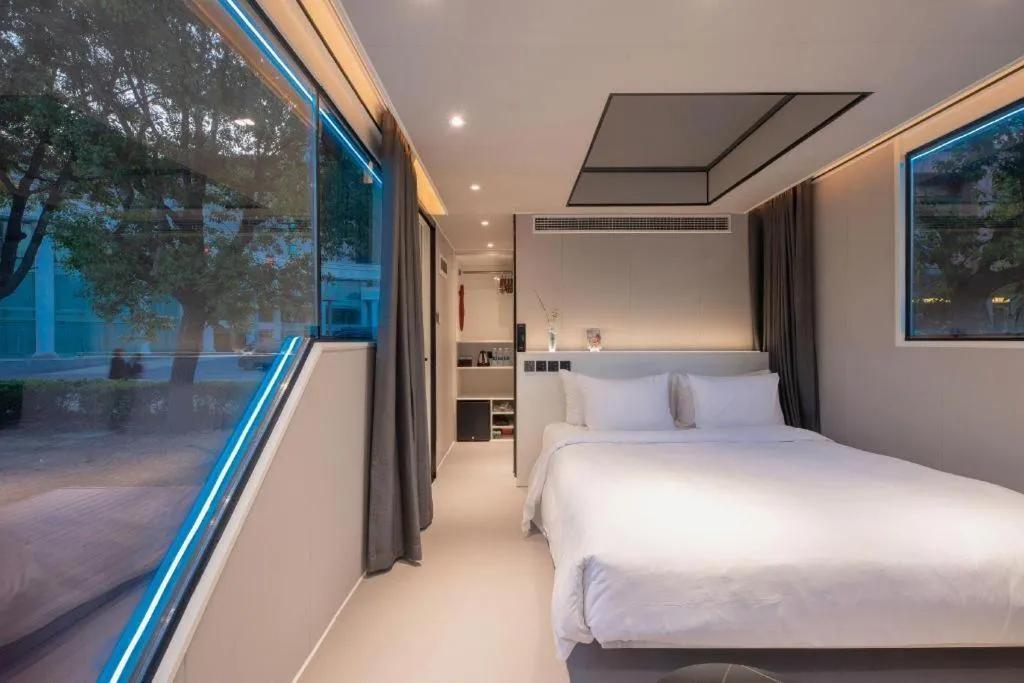 Bed in New Century Grand Hotel Xuzhou