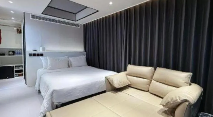 Bed in New Century Grand Hotel Xuzhou