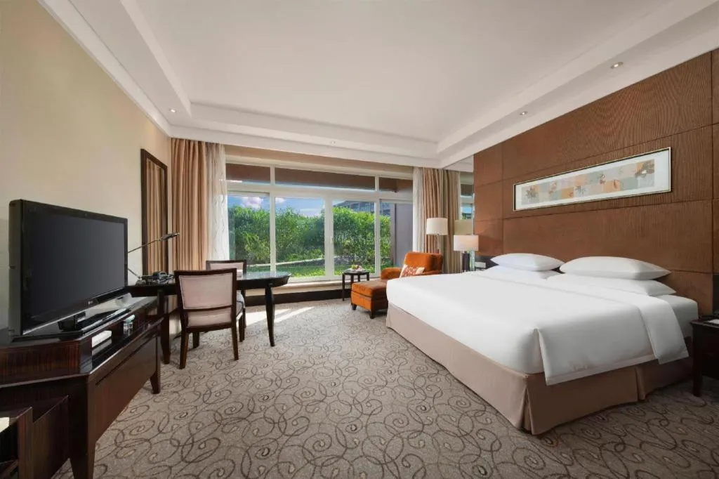 Bed in New Century Grand Hotel Xuzhou