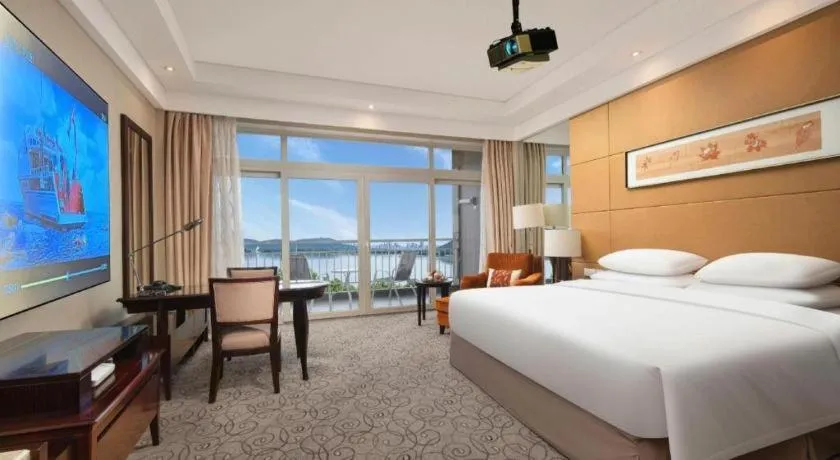 Bed in New Century Grand Hotel Xuzhou