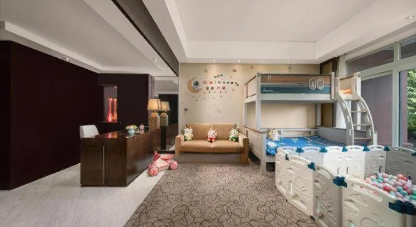 Bed in New Century Grand Hotel Xuzhou